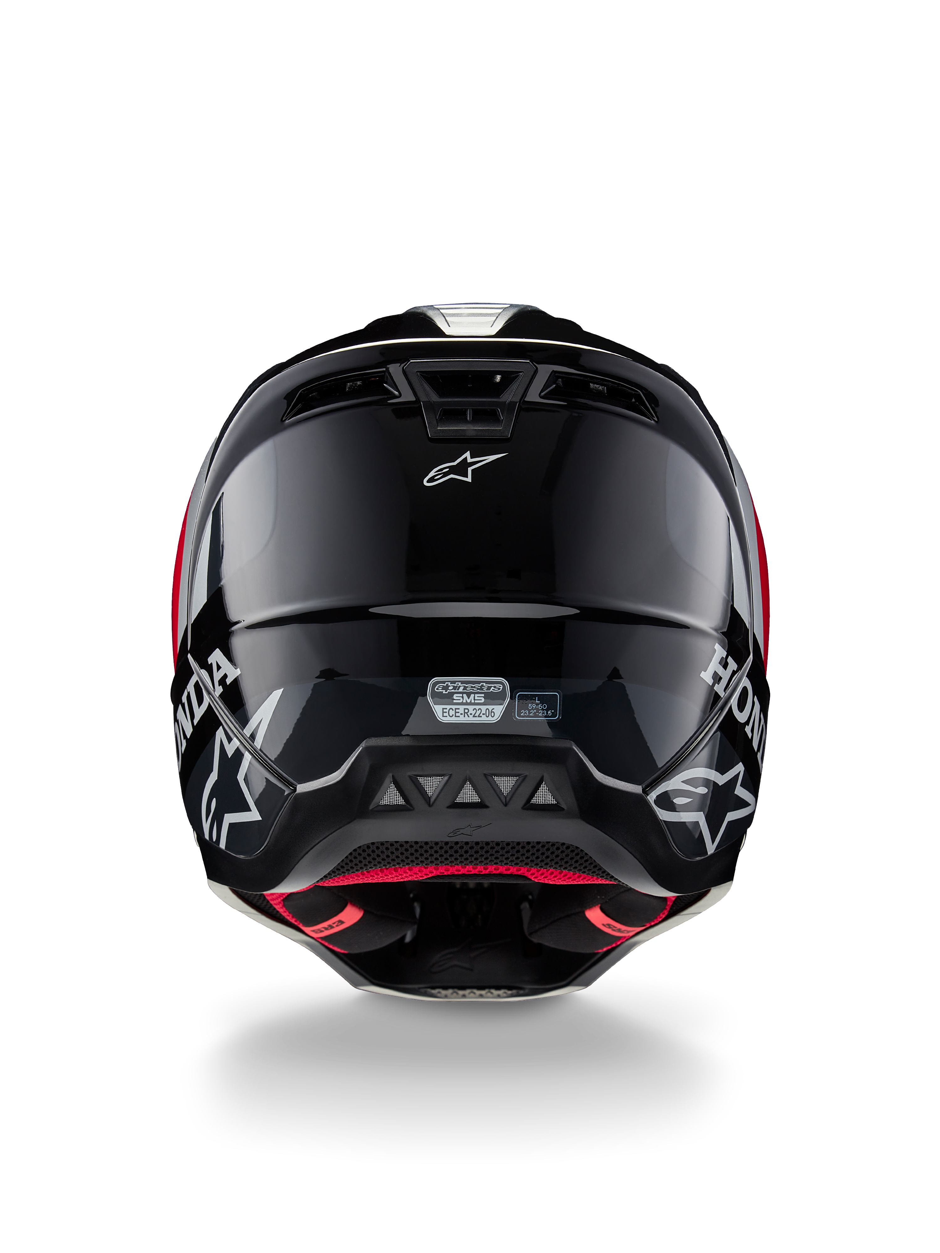 Alpinestars Honda S-M5 Helmet ECE, casco de motocross, negro y rojo brillante, vista trasera que muestra la calota negra brillante con logotipos blancos de Honda y Alpinestars, forro interior rojo y etiqueta de certificación de seguridad ECE