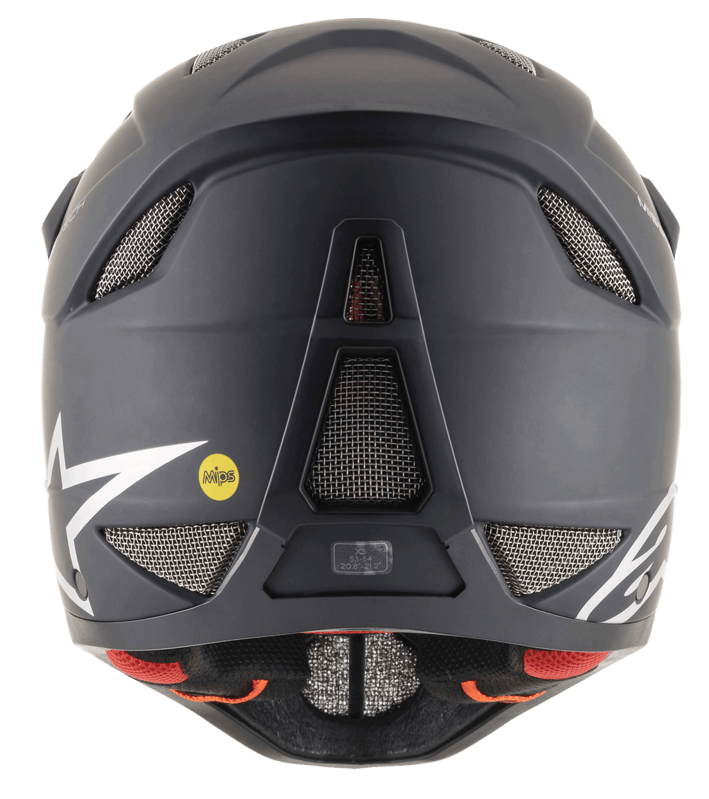Casco Alpinestars Missile Tech Solid negro mate, vista trasera con aberturas de malla y logo MIPS para descenso MTB.