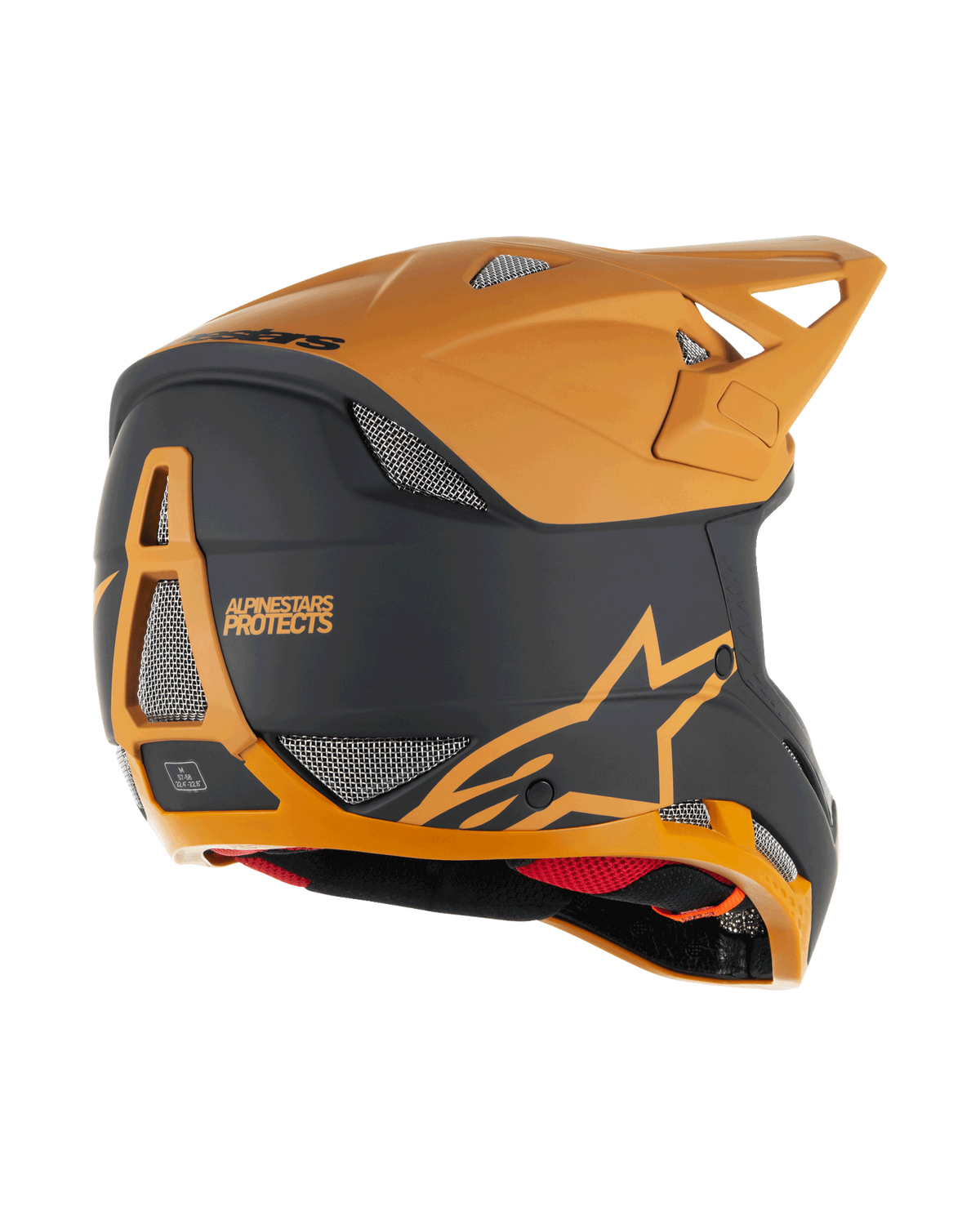 Casco Alpinestars Missile Tech Racer, casco de MTB integral, negro y dorado oscuro mate, vista lateral trasera con puertos de ventilación de malla, visera aerodinámica y logotipo Alpinestars Protects en la parte posterior, protección profesional para ciclismo de descenso.
