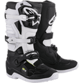 Alpinestars Stella Tech 3 para mujer, botas de motocross y off-road, negras y blancas, sistema de cierre de tres hebillas, placas de espinilla de TPU blanco con marca Alpinestars, parte superior de microfibra negra con paneles blancos, suelas blancas, calzado protector de alto rendimiento para mujeres pilotos