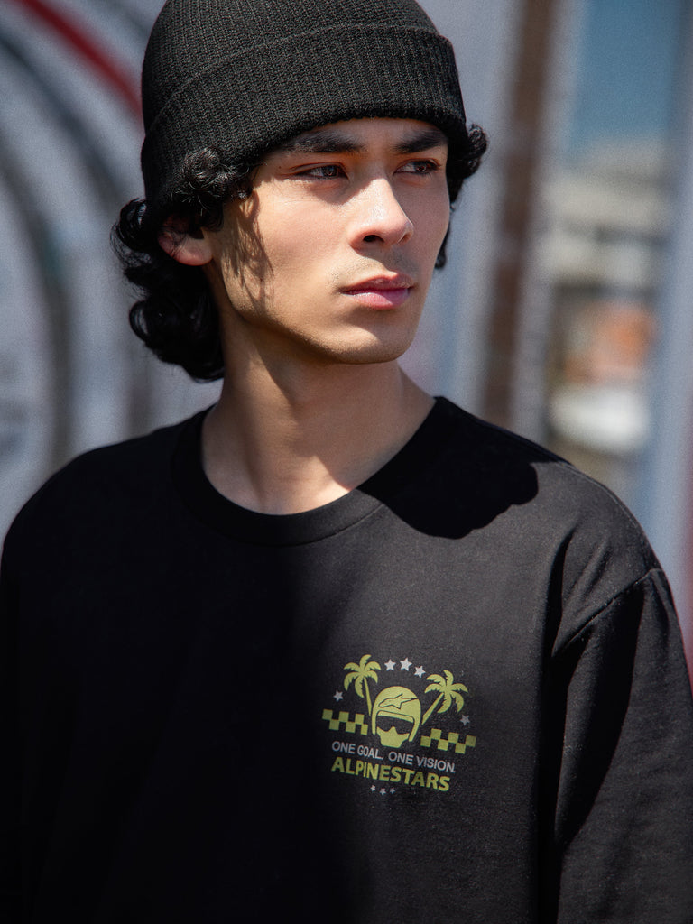 Alpinestars Order CSF Tee, camiseta de manga corta, negra, logotipo de casco y palmeras en verde lima con el texto One Goal One Vision, ropa de calle casual inspirada en el automovilismo