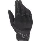 Guantes Alpinestars Stella Copper para mujer, guantes de moto negros, vista del dorso que muestra la construcción de malla y tejido, paneles de acordeón acanalados en los dedos, marca Alpinestars en el dedo índice y logo de estrella en la muñeca, diseño urbano ligero