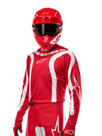 2024 Fluid Lurv Jersey, Motocross Racing Jersey, Mars Red and White, worn with matching red helmet and gloves, bold sporty design with white curved stripes and Alpinestars branding