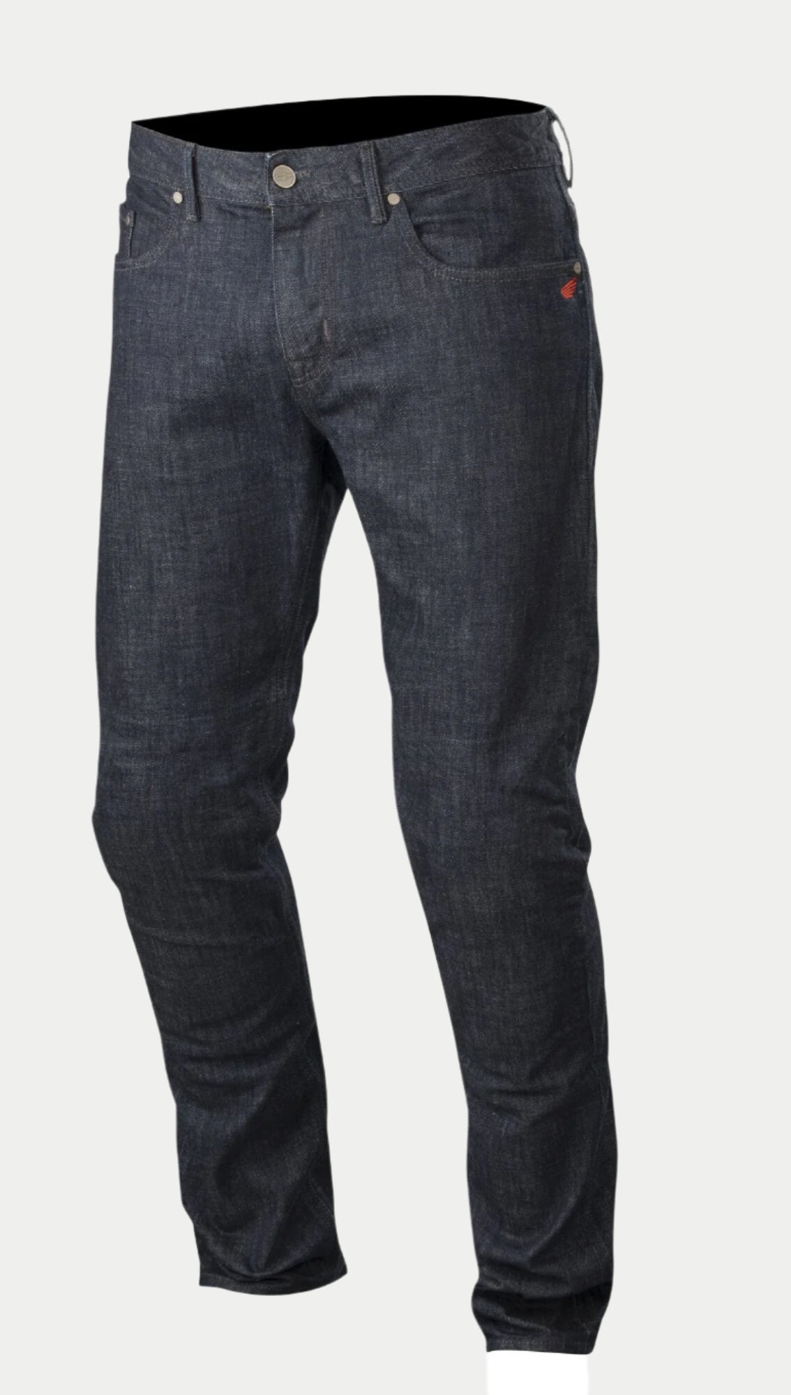 Alpinestars Copper Denim Pants, vaqueros de moto en color azul oscuro, con corte recto regular, diseño clásico de cinco bolsillos con un pequeño detalle de logo rojo y construcción de pierna preformada para conducción urbana.