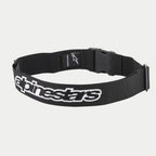 Alpinestars Pit Radio Belt, cinturón técnico de trabajo negro, con logo de Alpinestars bordado en blanco, cierre de hebilla de clip de plástico y material de poliéster elástico para uso de mecánicos en boxes.