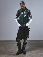 Alpinestars RSRV Alloy Leather Jacket, chaqueta de cuero premium para moto, verde, negra y blanca, acabado brillante, con logos y texto RSRV, cierre frontal, diseño urbano de estilo motorsport