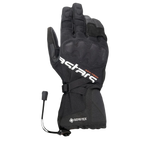Alpinestars XT-5 GORE-TEX Gloves, Black Motorcycle Gloves, featuring white Astars branding and orange ADV-TECH text, long cuff design with covered knuckle protection, GORE-TEX logo, and shock cord closure, adventure touring gear