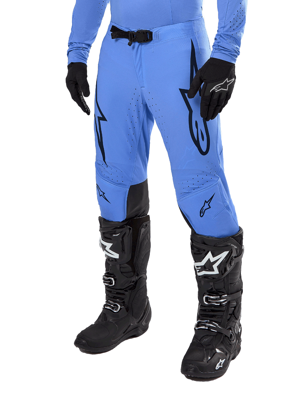 Alpinestars 2024 Supertech Dade Pants, Motocross Pants, Light Blue with black graphic logos, featuring ventilated perforations and a magnetic waist buckle, paired with black technical riding boots and gloves, professional off-road racing gear