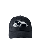 Alpinestars RSRV Shield Cap, gorra de béisbol negra con logo plateado y blanco reflectante, diseño angular moderno, visera curva, costuras visibles