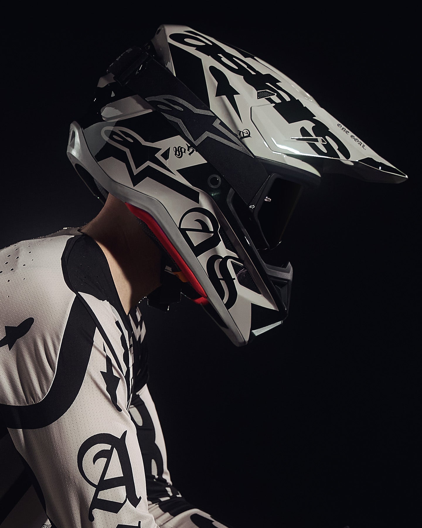 Alpinestars Limited Edition S-M7 Wolf Dust Helmet and Visor, Black and White motocross gear for off-road racing.