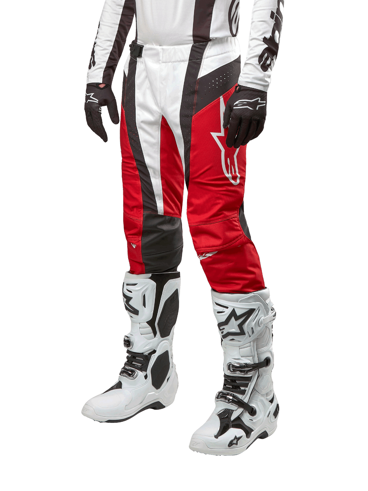 Alpinestars 2024 Techstar Ocuri Pants, Motocross Racing Pants, Mars Red White and Black, worn with matching white and black jersey, black gloves, and white racing boots with buckles, technical protective gear shown on a white background