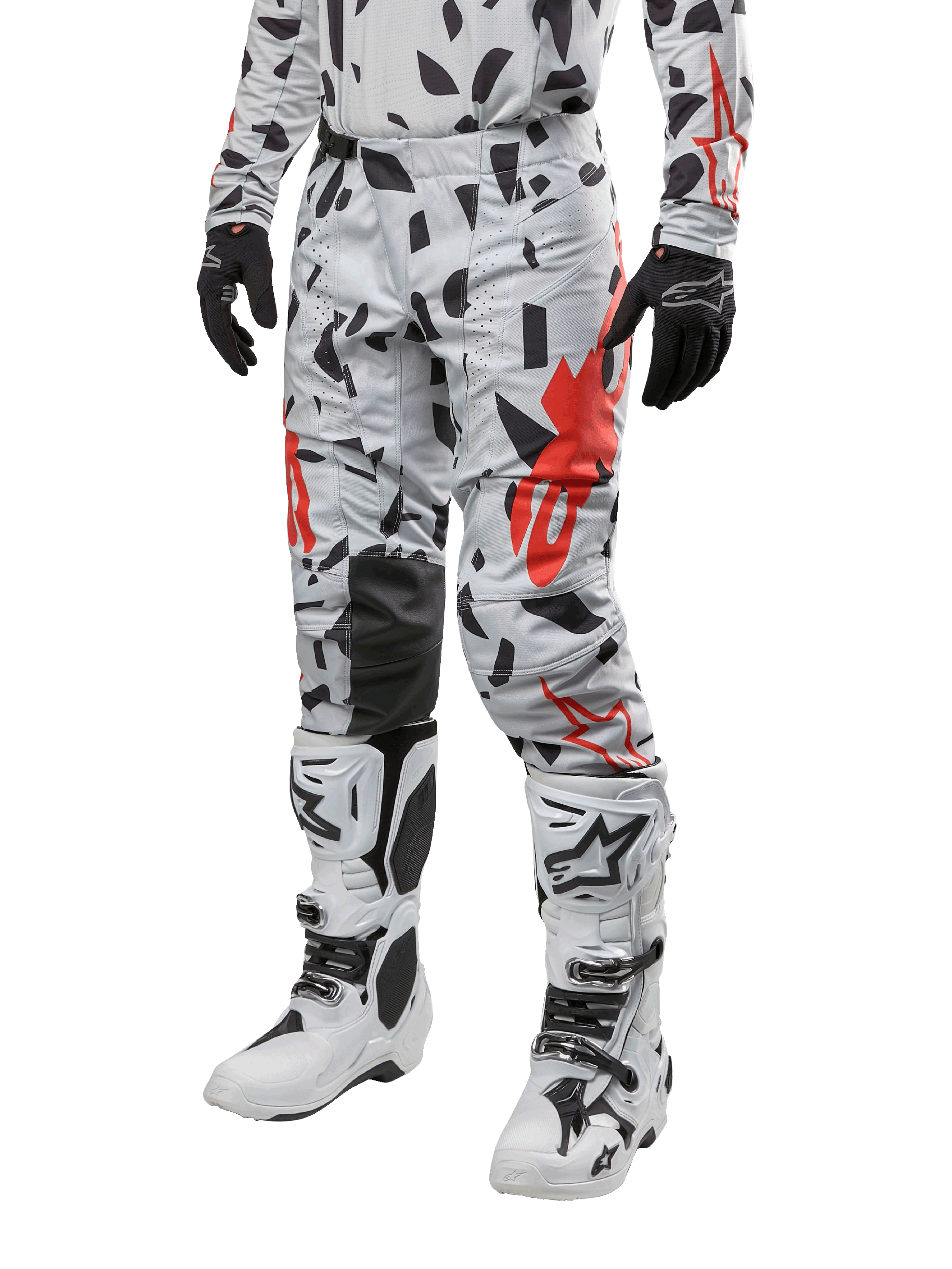 Alpinestars 2024 Techstar Rantera Pants, Motocross Pants, Haze Gray Camo with black and red abstract pattern, worn with matching jersey, black gloves, and white motocross boots, designed for high-performance off-road racing