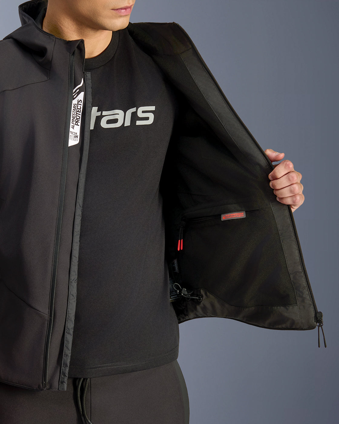 Alpinestars Aeroshell Waterproof Jacket for men in black, showcasing the Tech-Air Ready interior and waterproof inner pocket.