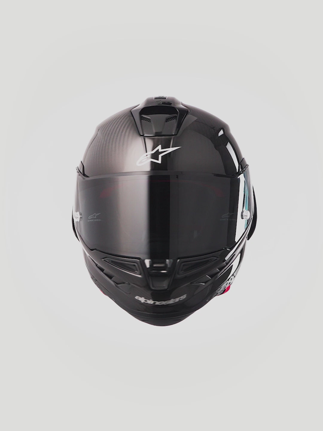 Alpinestars Supertech R10 Solid Helmet, Black Carbon Matte Glossy, full face motorcycle racing helmet, ECE and FIM certified carbon composite shell with aerodynamic rear spoiler and dark visor