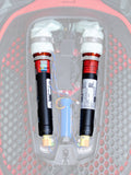 Alpinestars Tech-Air 7X & Off-Road Replacement Canister Kit, cartuchos de repuesto para airbag, negros con tapas blancas y bandas naranjas, dos cartuchos de argón instalados en un sistema de airbag electrónico con patrón de panal rojo y negro y cableado de colores