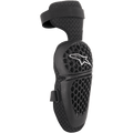 Alpinestars Youth Bionic Plus, rodilleras de protección para motocross y off-road, negras con carcasa de patrón de panal y logotipo de estrella blanco, cierre ajustable de doble correa y forro de malla 3D para ventilación