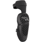 Alpinestars Youth Bionic Plus, rodilleras de protección para motocross y off-road, negras con carcasa de patrón de panal y logotipo de estrella blanco, cierre ajustable de doble correa y forro de malla 3D para ventilación